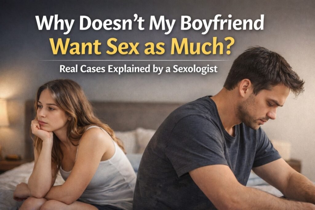 Couple sitting apart on bed looking distant and stressed about mismatched sex drive in relationship